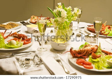 New year dinner with lobster and champagne