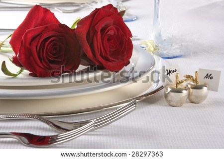 stock photo Wedding table with roses and name cards