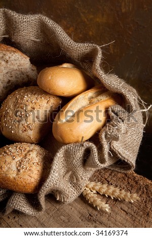 Vintage jute bag filled with fresh bread