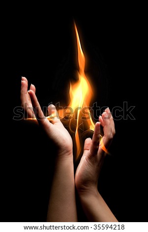 Open hands catching a mystical burning flame