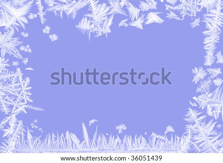 Border frame made of real ice flowers of several frosted windows
