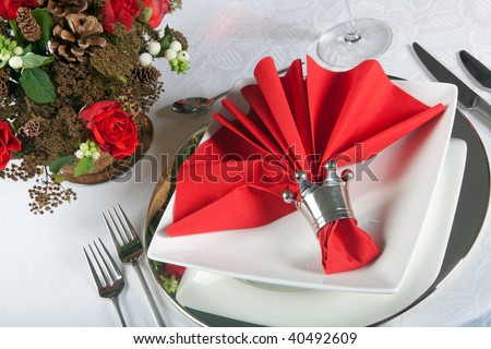 stock photo Festive Christmas or wedding table with red napkins on a white