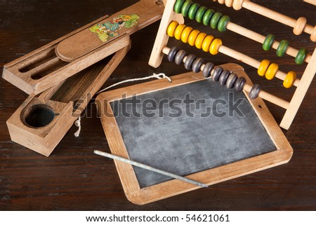 School image with antique slate and abacus