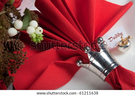 stock photo Festive Christmas or wedding table with red napkins on a white