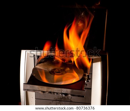 Computer disaster and cd drive on fire