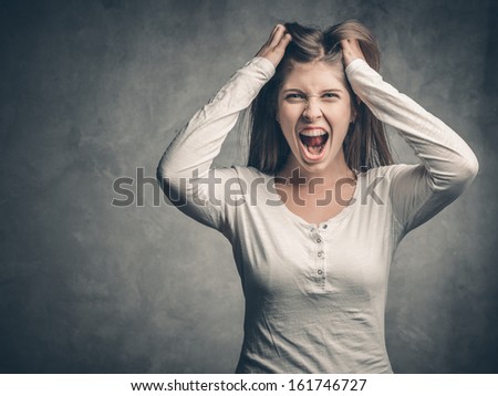 desperate woman with hand in the hair