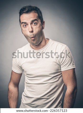 Young man making funny face