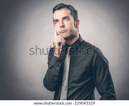Portrait of businessman thinking
