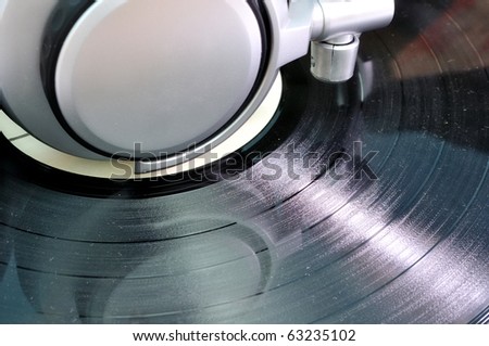 Headphone over dusty old vinyl music theme