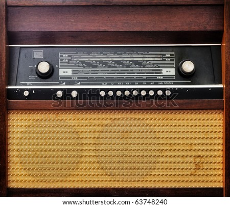 Vintage old radio set grunge photo. Musical background