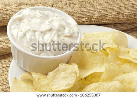 Fresh Potato Chips with Ranch Dip on a background