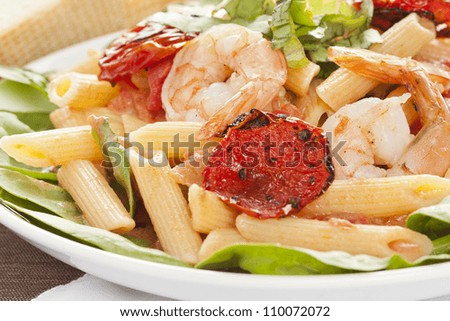 Homemade Shrimp Pasta with tomatoes and green spinach
