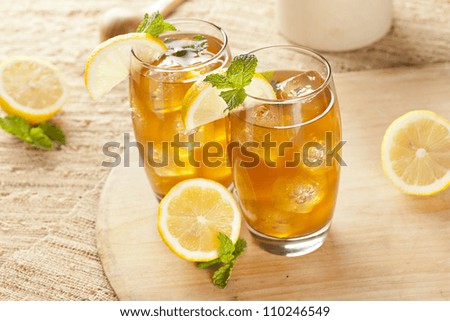 Refreshing Iced Tea with Lemon against a background