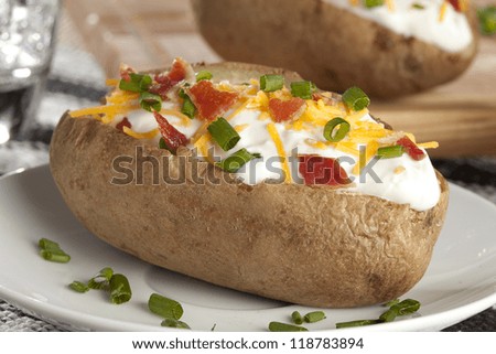 Hot Baked Potato with chives, cheese, and sour cream