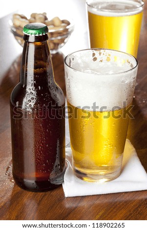 Refreshing Ice Cold Beer against a background