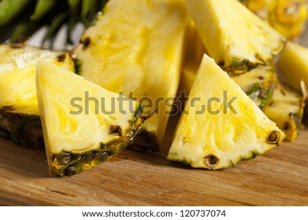 Fresh Yellow Organic Pineapple cut into slices