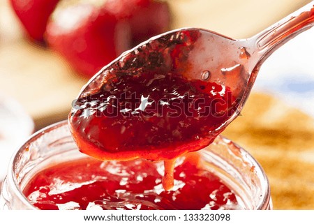 Homemade Organic Red Strawberry Jelly against a background
