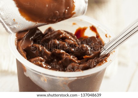 Chocolate Snack Pack Pudding Cup Against a Background