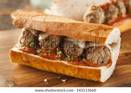 Homemade Spicy Meatball Sub Sandwich With Marinara Sauce And Cheese