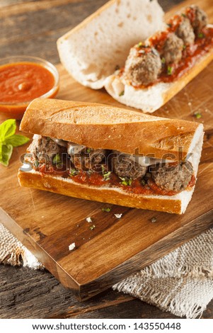 Homemade Spicy Meatball Sub Sandwich with Marinara Sauce and Cheese