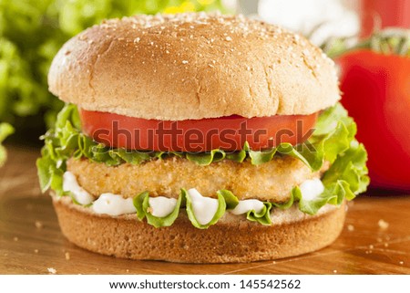 Breaded Chicken Patty Sandwich on a Bun with Lettuce and Tomato