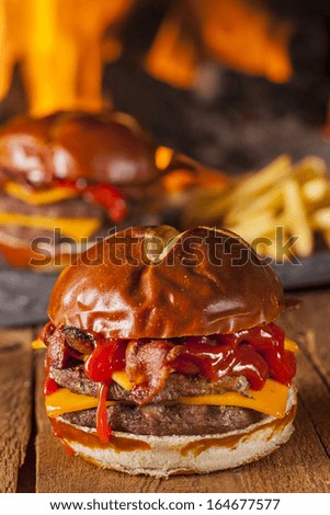 Unhealthy Homemade Barbecue Bacon Cheeseburger with Fries