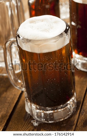 Cold Refreshing Root Beer with Foam in a Mug