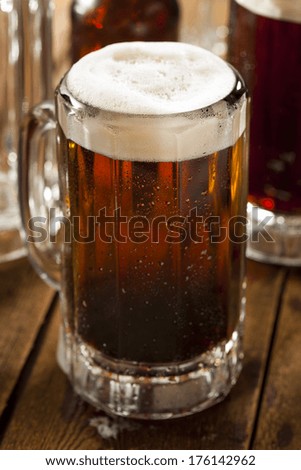 Cold Refreshing Root Beer with Foam in a Mug