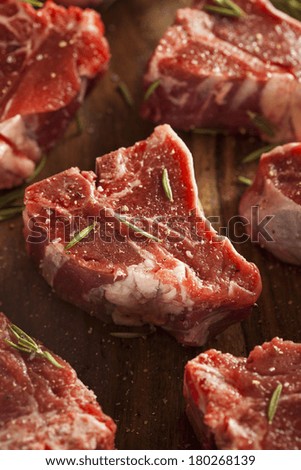 Raw Red Lamb Chops with Salt and Pepper Seasoning