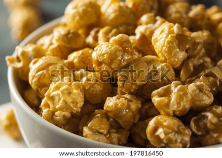 Homemade Golden Caramel Popcorn in a Bowl