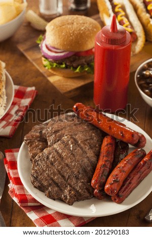 Grilled Hamburgers and Hot Dogs Ready to Eat