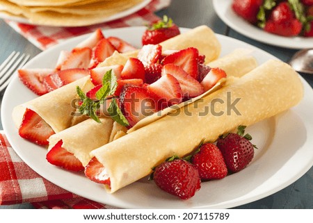 Fresh Strawberry French Crepes with Mint for Breakfast
