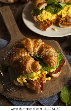 Ham and Cheese Egg Breakfast Sandwich on a Croissant