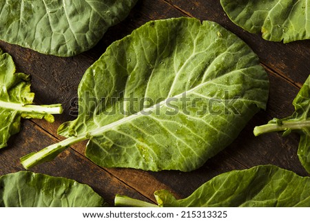 Raw Organic Green Collard Greens on a Background