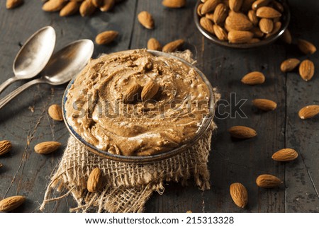 Raw Organic Almond Butter on a Background