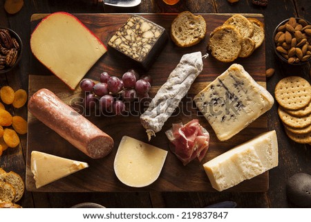Fancy Meat and Cheeseboard with Fruit as an Appetizer