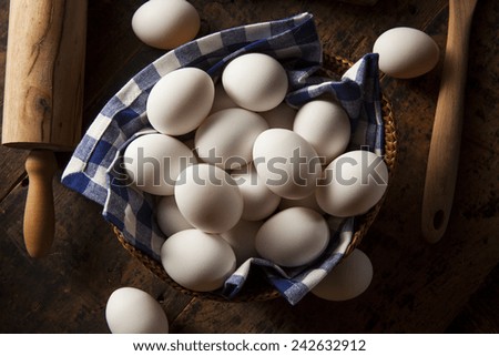 Raw Organic White Eggs in a Basket
