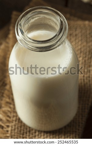 Refreshing Organic White Whole Milk in a Bottle