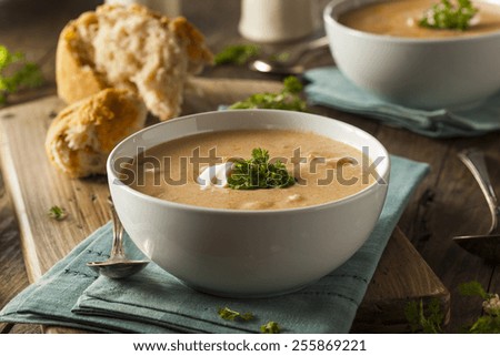 Homemade Lobster Bisque Soup with Cream and Parsley
