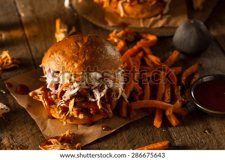 Homemade Pulled Chicken Sandwich with Coleslaw and Fries