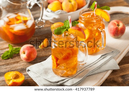 Fresh Homemade Peach Sweet Tea with Mint