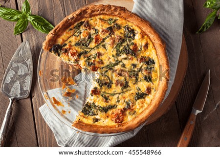 Homemade Cheesy Egg Quiche for Brunch with Spinach and Tomato