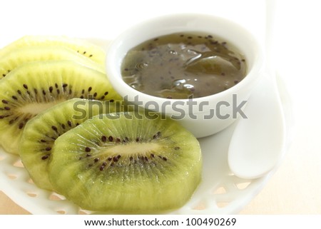 Freshness cut fruit, Kiwi fruit on elegant dish with copy space on white background