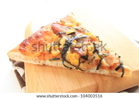 Teriyaki chicken Pizza on wooden cutting board