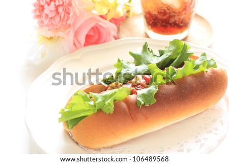 gourmet fast food, hot dog and cola with elegant flower for fast food image