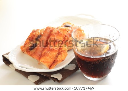 Cola with lemon and pizza