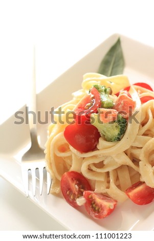 Italian cuisine, cherry tomato and salmon pasta