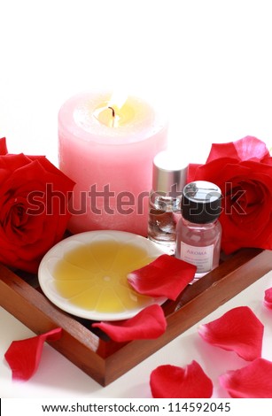 elegant red rose with aroma candle for aromatherapy image
