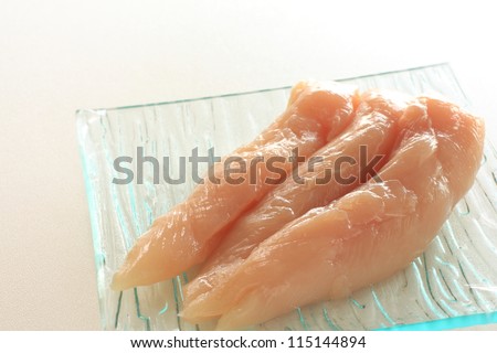 Freshness raw chicken breast from Japan on glass dish with copy space