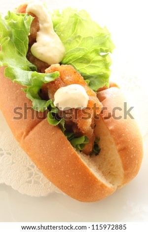 Japanese food, fried chicken in hotdog style for school canteen food image